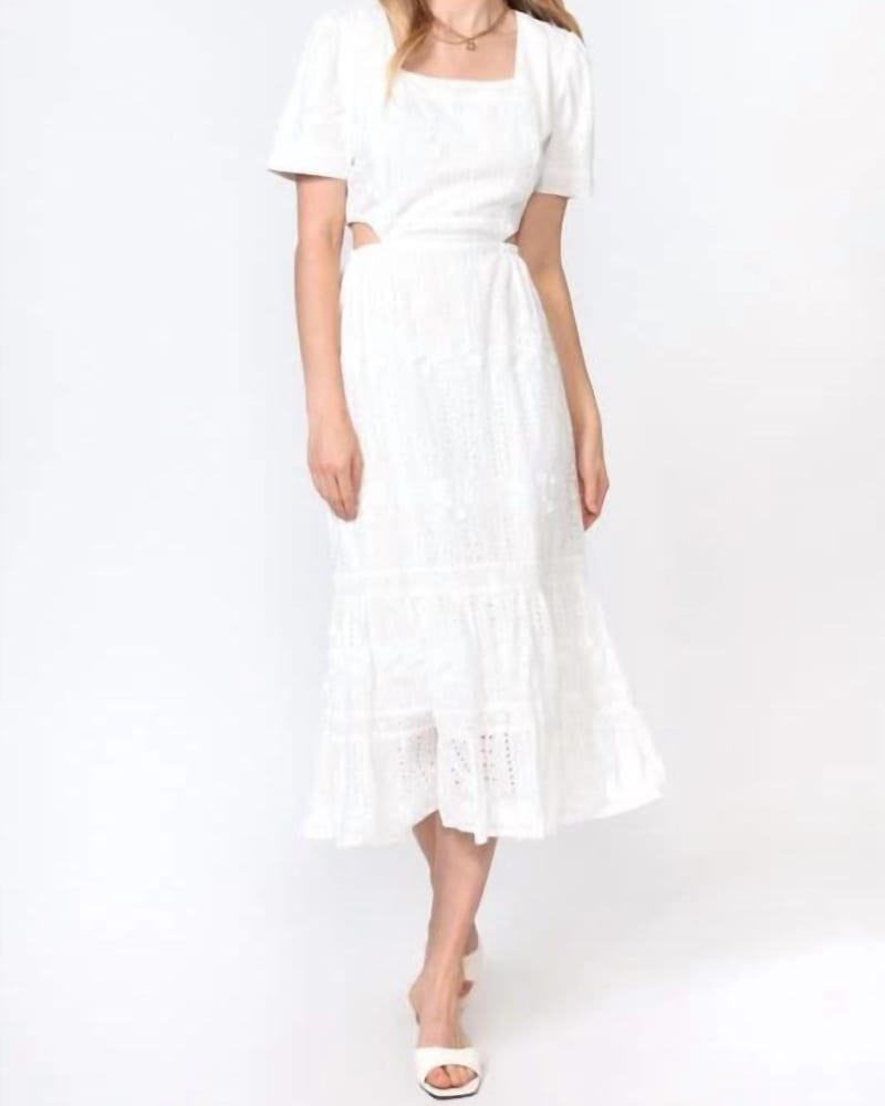 Front of a model wearing a size Large Katina Embroidered Cut Out Midi Dress in White in White by Adelyn Rae. | dia_product_style_image_id:346480